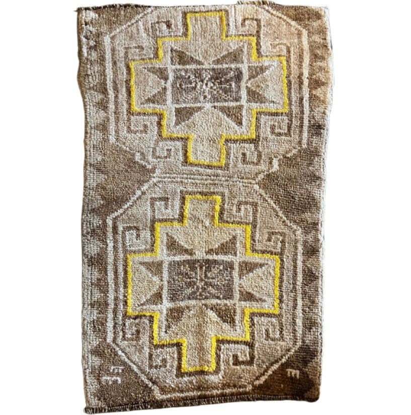 Small yellow rug