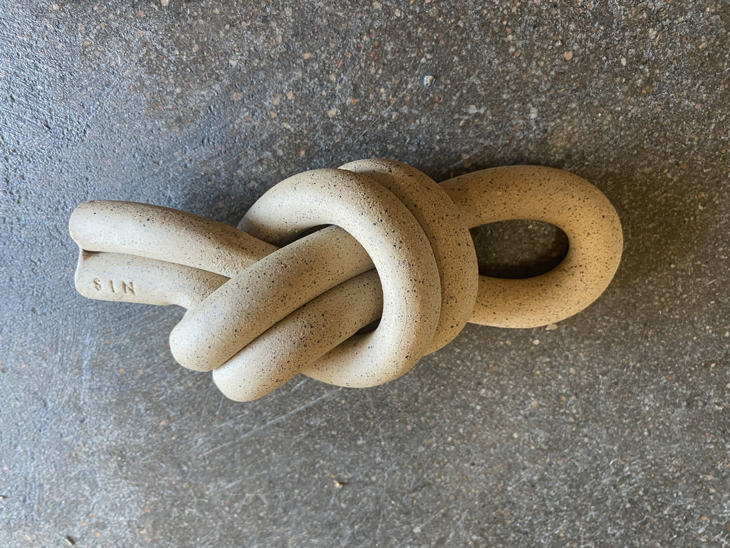 Tan ceramic knot
